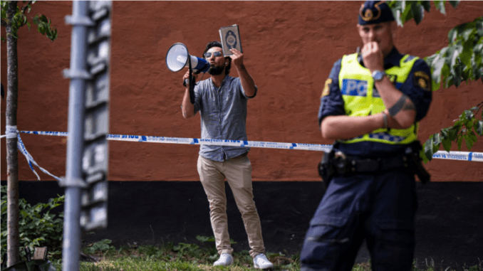 Iraqi Refugee Salwan Momika Sparks Outrage by Burning Quran Outside Stockholm Mosque