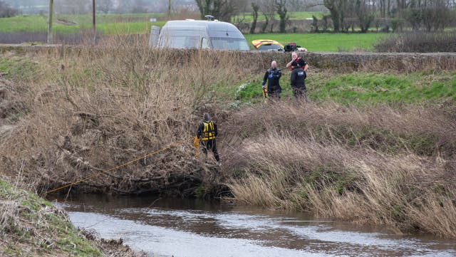 A police diving team at the River Wyre near St Michael's on Wyre